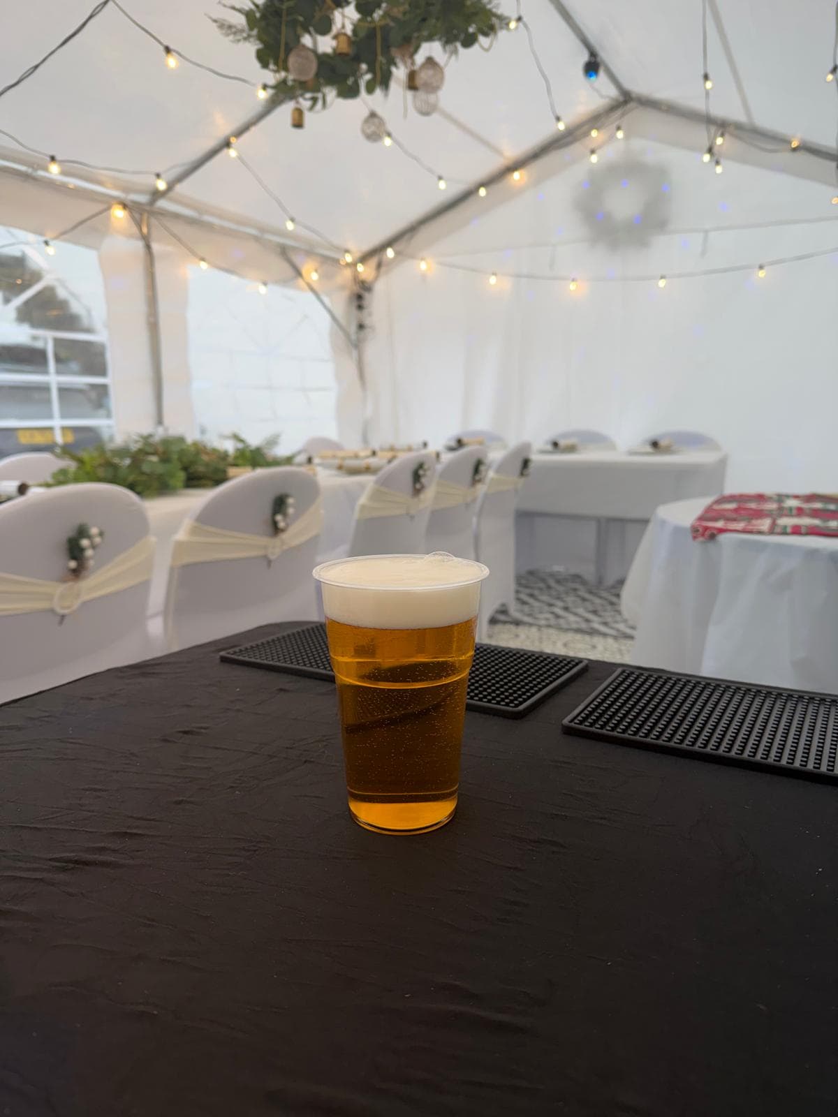 Pint poured at a marquee wedding